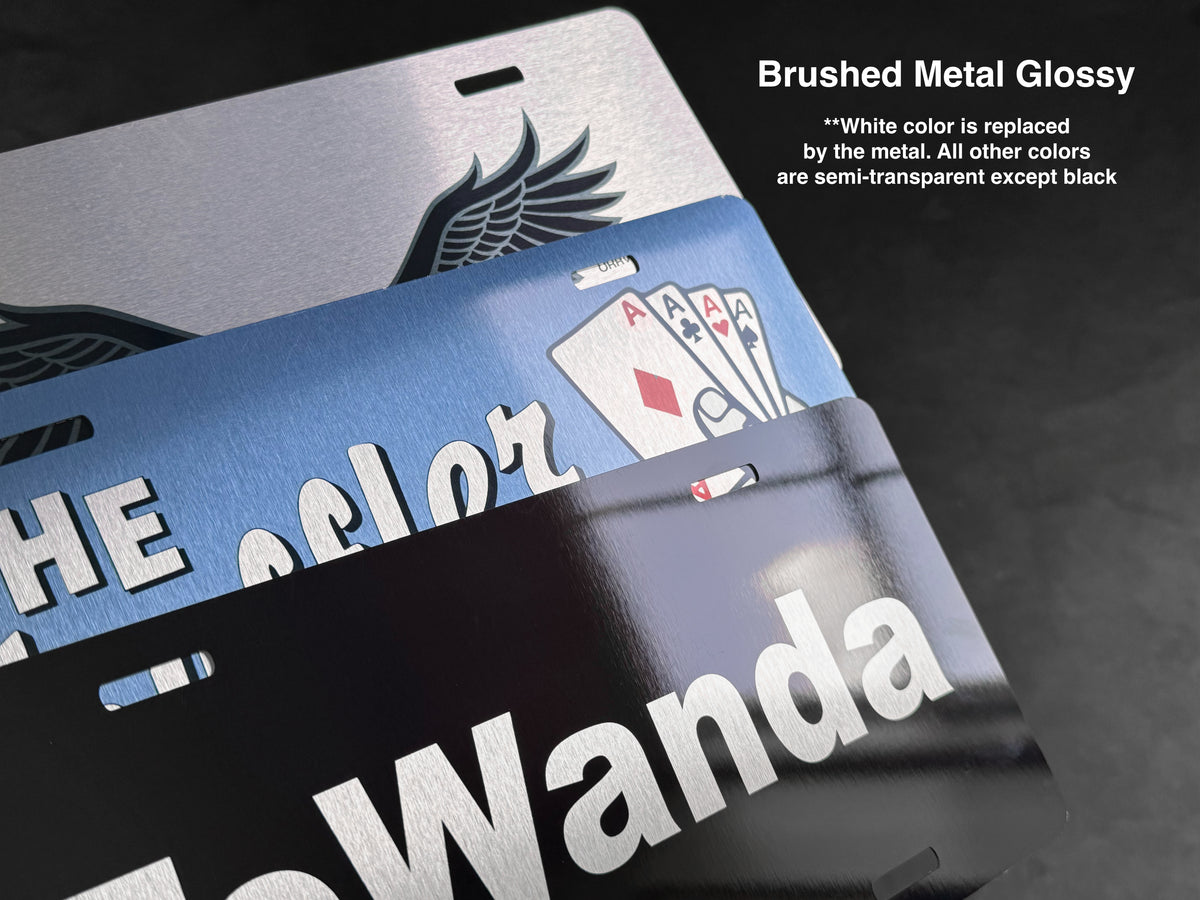 Three glossy brushed metal license plate frames stacked diagonally, showing silver, blue, and black options with white lettering and playing card graphics. Text on the image notes that white color is replaced by the metal and all other colors are semi-transparent except black.