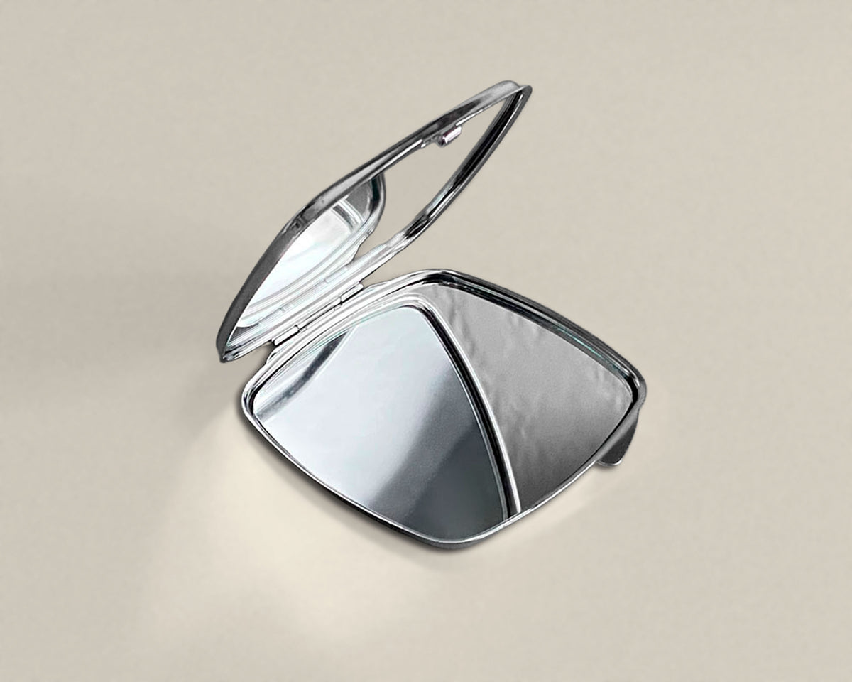 Personalized silver compact rounded square mirror shown in the open position. 