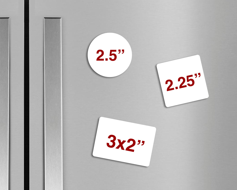 Three white refrigerator magnets with red size markings ('2.5"', '2.25"', '3x2"') shown on a brushed stainless steel surface.